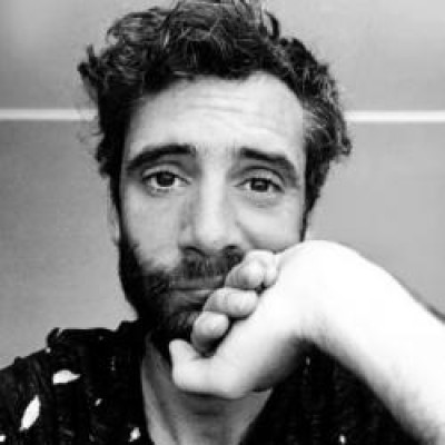 J.